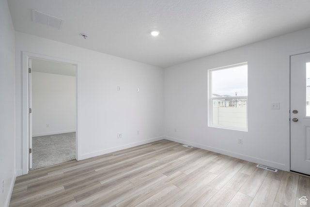 1857 E Bison Dr Unit B217, Eagle Mountain, UT 84005 - unfurnished room featuring light wood-style flooring and a pendent fire sprinkler