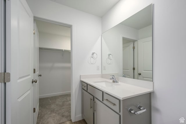 1857 E Bison Dr Unit B217, Eagle Mountain, UT 84005 - bathroom featuring vanity and baseboards