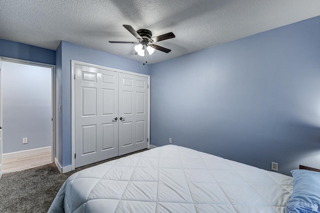 709 N 2200 E, St George, UT 84790 - bedroom with carpet, a closet, and a ceiling fan