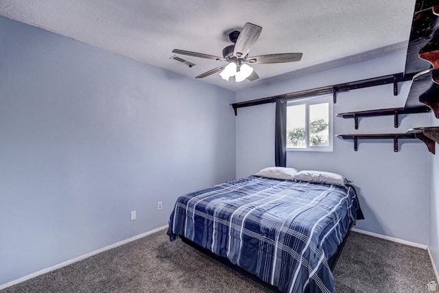 709 N 2200 E, St George, UT 84790 - bedroom featuring carpet, a textured ceiling, and a ceiling fan
