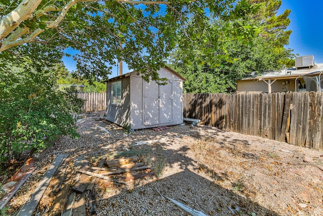 709 N 2200 E, St George, UT 84790 - fenced backyard featuring a storage shed
