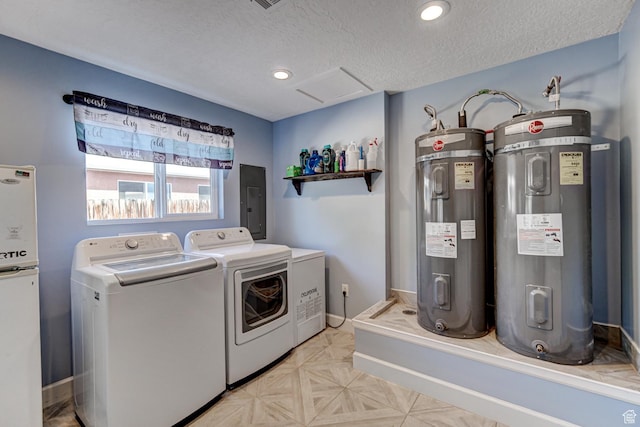 709 N 2200 E, St George, UT 84790 - laundry room with electric water heater, washer and clothes dryer, electric panel, attic access, and a textured ceiling