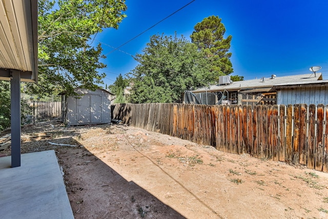 709 N 2200 E, St George, UT 84790 - fenced backyard with a storage unit