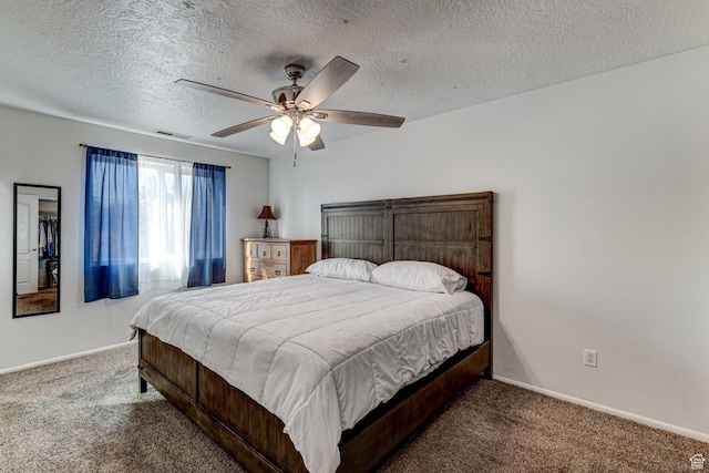 709 N 2200 E, St George, UT 84790 - bedroom featuring carpet floors, a ceiling fan, and a textured ceiling