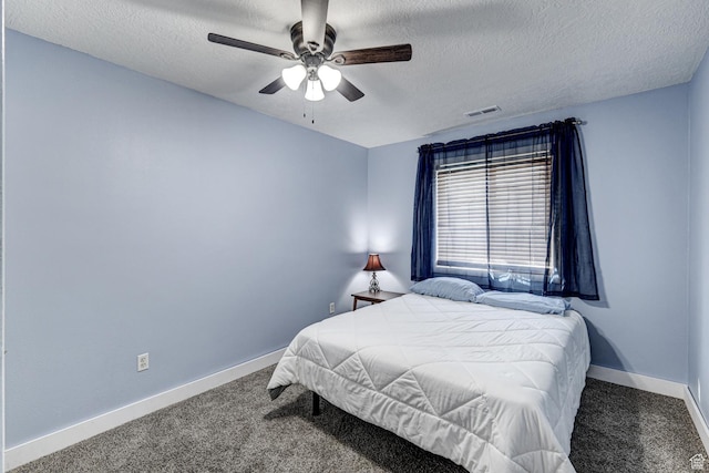 709 N 2200 E, St George, UT 84790 - bedroom with carpet floors, a textured ceiling, and ceiling fan