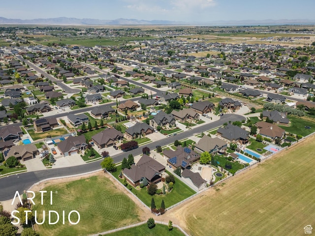 2124 N Heritage Dr, Farr West, UT 84404 - aerial overview of property's location featuring mountains and nearby suburban area