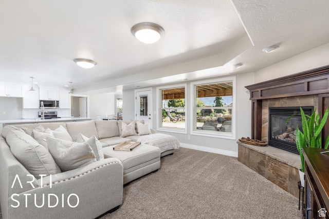2124 N Heritage Dr, Farr West, UT 84404 - carpeted living room with a fireplace and a textured ceiling