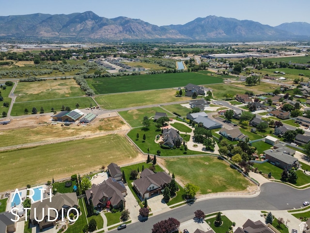 2124 N Heritage Dr, Farr West, UT 84404 - aerial view of a mountain backdrop