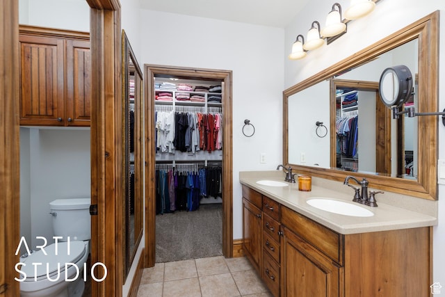 2124 N Heritage Dr, Farr West, UT 84404 - full bath featuring double vanity, a spacious closet, and tile patterned flooring
