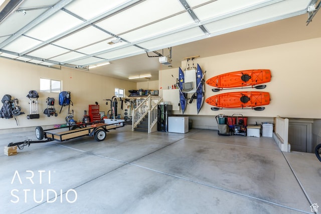 2124 N Heritage Dr, Farr West, UT 84404 - garage featuring a garage door opener