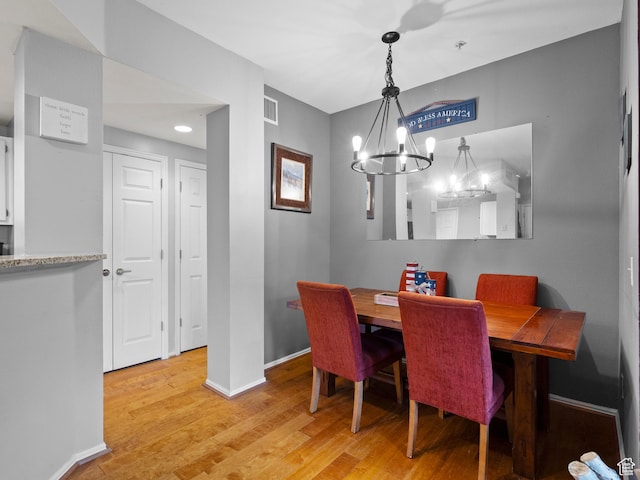 900 Bitner Rd Unit D 34, Park City, UT 84098 - dining room with a chandelier and light wood-style flooring