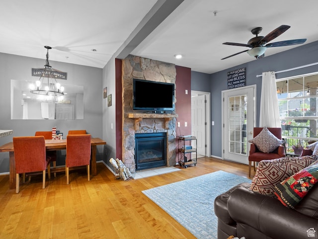 900 Bitner Rd Unit D 34, Park City, UT 84098 - living room featuring wood finished floors, a chandelier, ceiling fan, a stone fireplace, and recessed lighting
