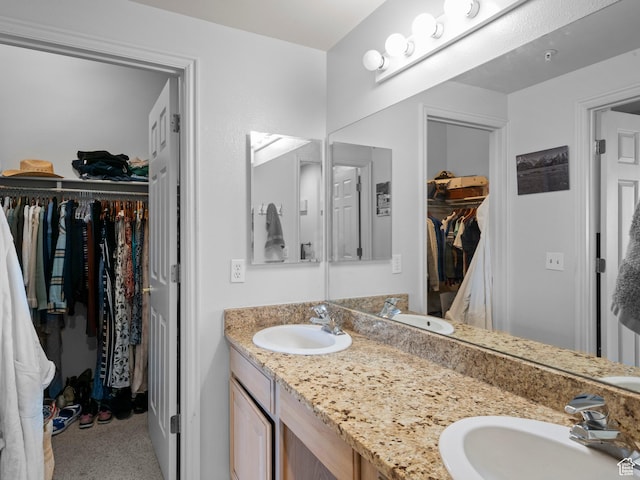 900 Bitner Rd Unit D 34, Park City, UT 84098 - bathroom featuring double vanity and a spacious closet