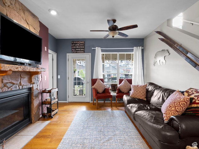 900 Bitner Rd Unit D 34, Park City, UT 84098 - living area with healthy amount of natural light, a ceiling fan, light wood-style floors, a stone fireplace, and recessed lighting