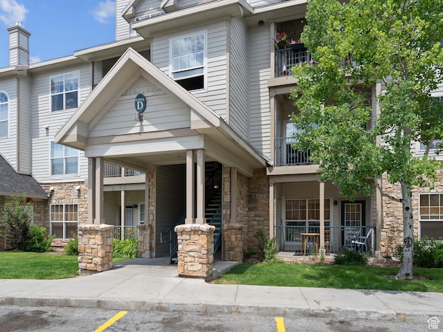 900 Bitner Rd Unit D 34, Park City, UT 84098 - view of front facade with stone siding and a porch
