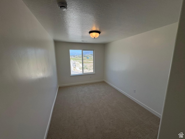 306 E 1480 N Unit 44, Salem, UT 84653 - carpeted empty room featuring a smoke detector and a textured ceiling