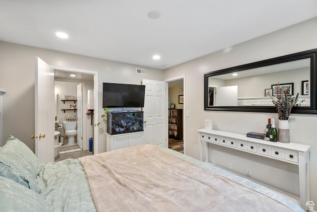 1289 E Ridge Meadow Ln S Unit 8S, Cottonwood Heights, UT 84047 - bedroom with recessed lighting and ensuite bathroom