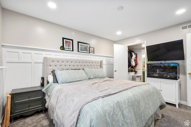 1289 E Ridge Meadow Ln S Unit 8S, Cottonwood Heights, UT 84047 - carpeted bedroom featuring recessed lighting, a spacious closet, and a closet