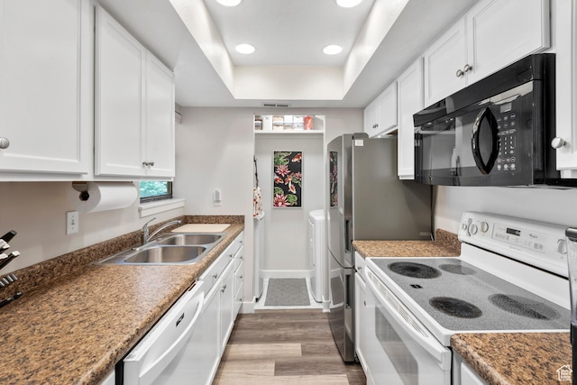 1289 E Ridge Meadow Ln S Unit 8S, Cottonwood Heights, UT 84047 - kitchen with white appliances, plenty of natural light, white cabinetry, and recessed lighting