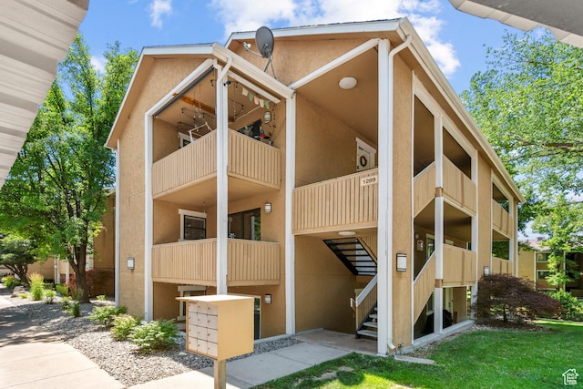 1289 E Ridge Meadow Ln S Unit 8S, Cottonwood Heights, UT 84047 - view of apartment building / complex with stairs