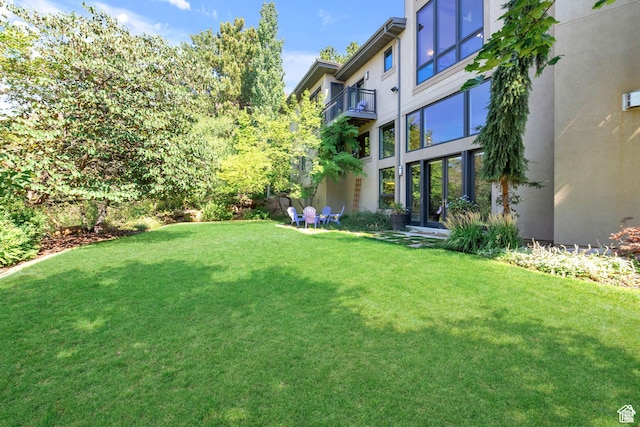 4127 E Mathews Way S, Salt Lake City, UT 84124 - view of grassy yard featuring a balcony