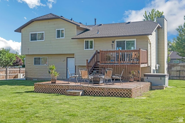 254 W 1600 N, Harrisville, UT 84404 - back of property with a deck, a chimney, and roof with shingles