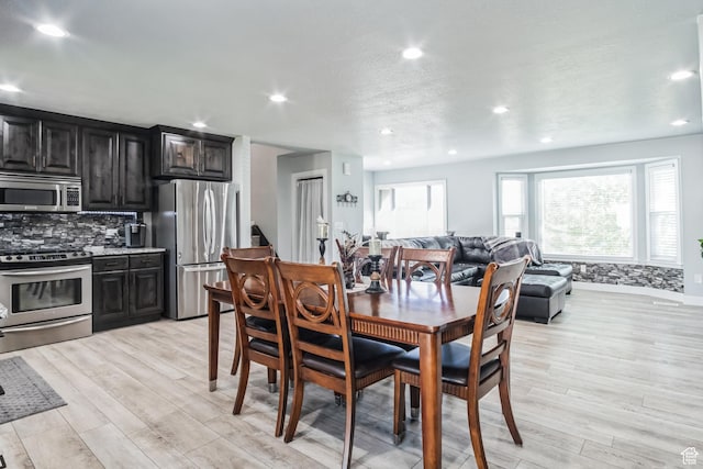 254 W 1600 N, Harrisville, UT 84404 - dining space with light wood-style flooring and recessed lighting