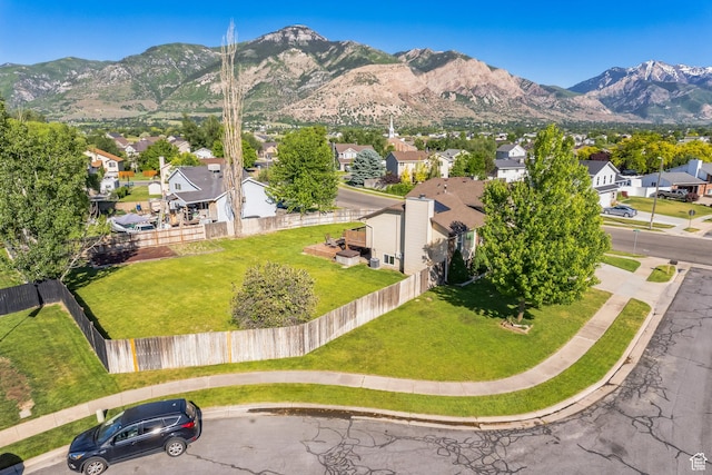 254 W 1600 N, Harrisville, UT 84404 - aerial view of property's location with nearby suburban area and a mountainous background