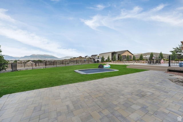8656 N W Dr E, Eagle Mountain, UT 84005 - view of patio with a mountain view