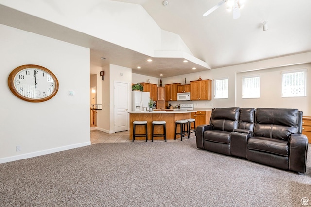 674 E Free Land Ave S, Midvale, UT 84047 - living room with light colored carpet, healthy amount of natural light, recessed lighting, high vaulted ceiling, and a ceiling fan