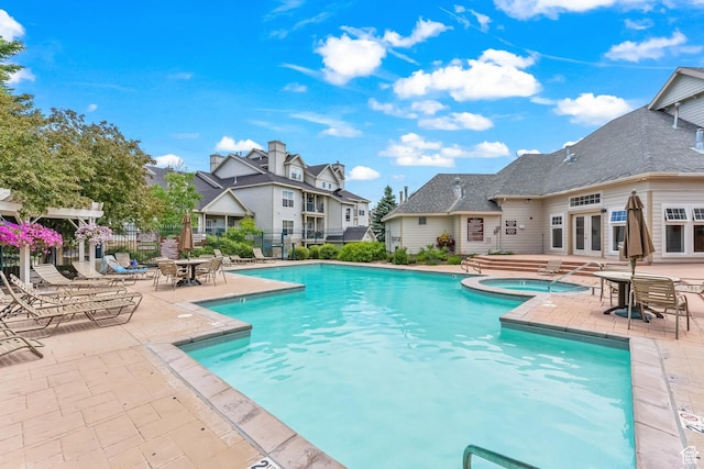 900 Bitner Rd Unit K25, Park City, UT 84098 - community pool with a community hot tub, a patio, french doors, and a residential view