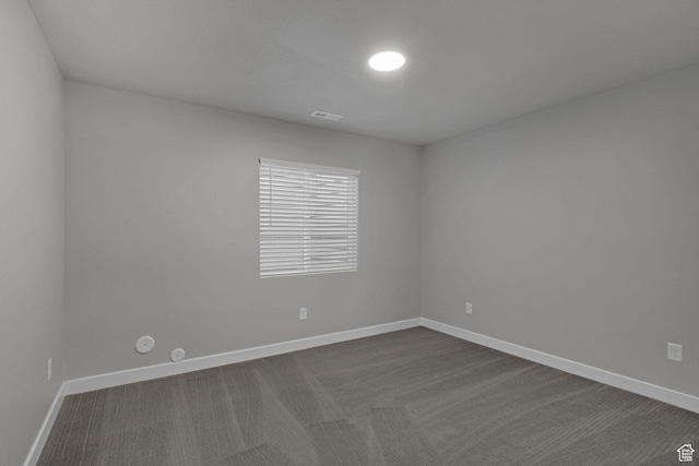 1792 W Norway Spruce Dr, Layton, UT 84041 - empty room with dark colored carpet and baseboards