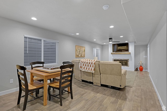 1792 W Norway Spruce Dr, Layton, UT 84041 - dining area with a brick fireplace, light wood-style flooring, recessed lighting, and a ceiling fan