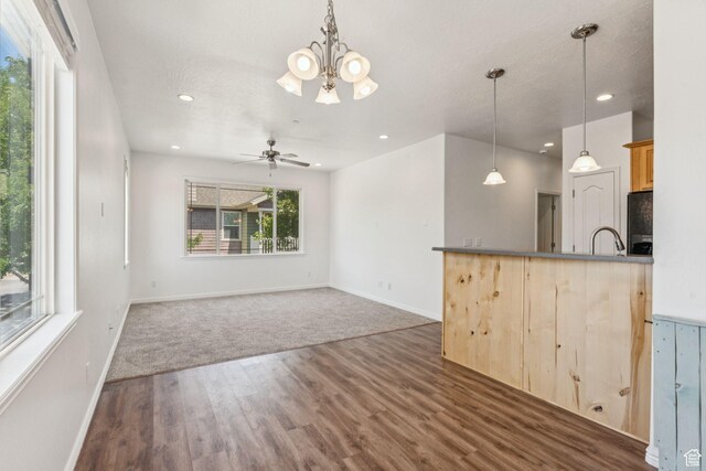 1535 W 80 S, Pleasant Grove, UT 84062 - kitchen with fridge, dark wood-type flooring, a chandelier, recessed lighting, and light brown cabinets