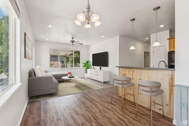 1535 W 80 S, Pleasant Grove, UT 84062 - living room featuring wood finished floors, a chandelier, recessed lighting, and a ceiling fan