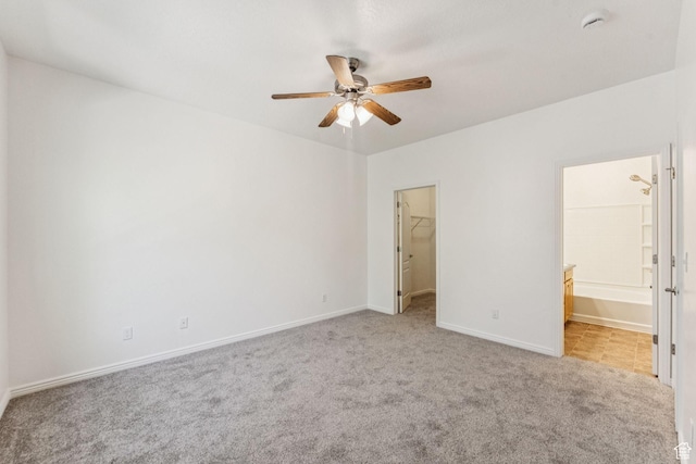 1535 W 80 S, Pleasant Grove, UT 84062 - unfurnished bedroom with light carpet, a spacious closet, ensuite bath, ceiling fan, and a closet