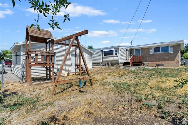 2184 Sorrento Dr, Woods Cross, UT 84087 - back of house with brick siding
