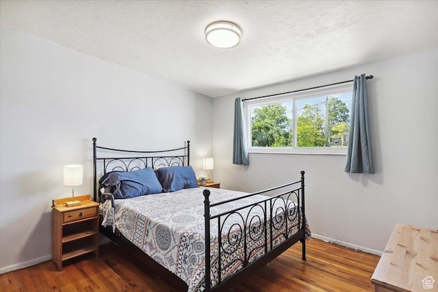 2184 Sorrento Dr, Woods Cross, UT 84087 - bedroom featuring wood finished floors and baseboards