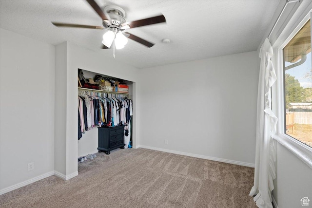 7351 W Zana Ln, Magna, UT 84044 - unfurnished bedroom featuring carpet flooring, a closet, and ceiling fan