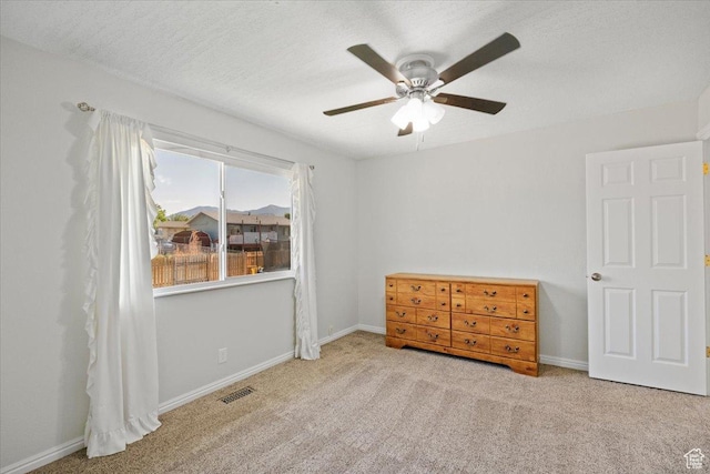 7351 W Zana Ln, Magna, UT 84044 - carpeted bedroom with a ceiling fan and baseboards