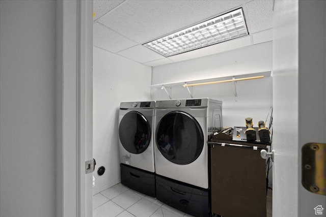 7351 W Zana Ln, Magna, UT 84044 - washroom featuring washer and dryer and light tile patterned floors