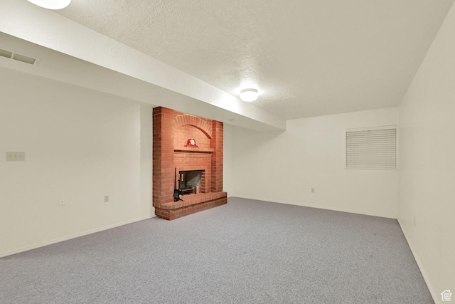 293 E 5450 S Unit 19, Washington Terrace, UT 84405 - finished basement with a fireplace, carpet, and a textured ceiling