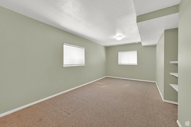 293 E 5450 S Unit 19, Washington Terrace, UT 84405 - carpeted empty room featuring baseboards and a textured ceiling