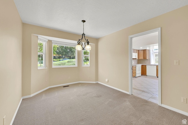 293 E 5450 S Unit 19, Washington Terrace, UT 84405 - empty room with light carpet, a chandelier, and a textured ceiling
