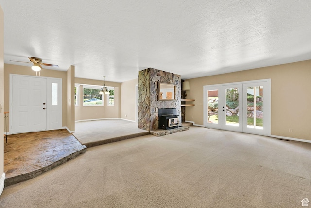 293 E 5450 S Unit 19, Washington Terrace, UT 84405 - unfurnished living room with carpet, a textured ceiling, french doors, and ceiling fan