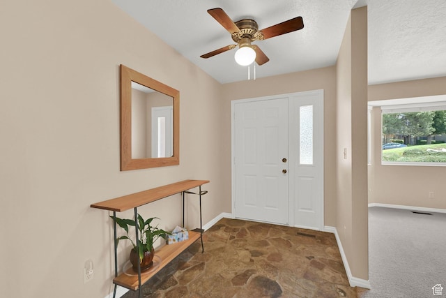 293 E 5450 S Unit 19, Washington Terrace, UT 84405 - foyer with stone finish floors, a ceiling fan, and carpet floors