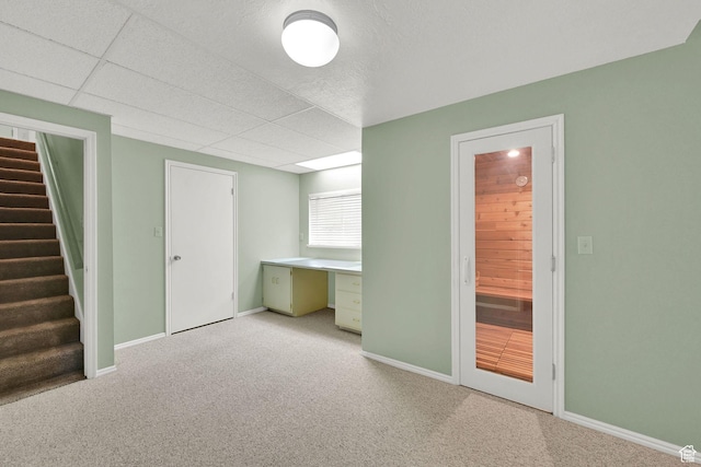 293 E 5450 S Unit 19, Washington Terrace, UT 84405 - unfurnished bedroom with light carpet, a desk, and a drop ceiling