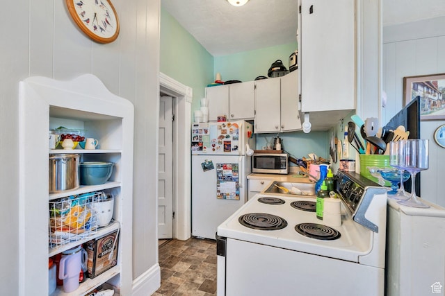 442 N 100 E, Provo, UT 84606 - kitchen featuring white appliances, white cabinets, light countertops, and stone finish floors