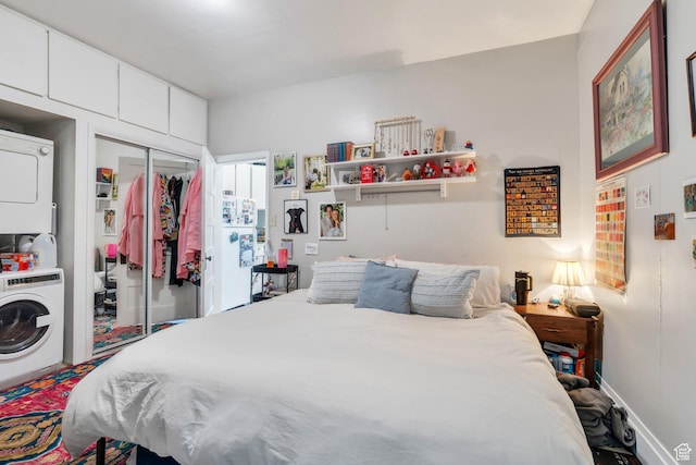 442 N 100 E, Provo, UT 84606 - bedroom with stacked washing machine and dryer and a closet