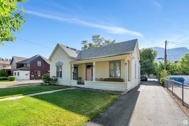 442 N 100 E, Provo, UT 84606 - bungalow-style house with a porch, a shingled roof, and asphalt driveway